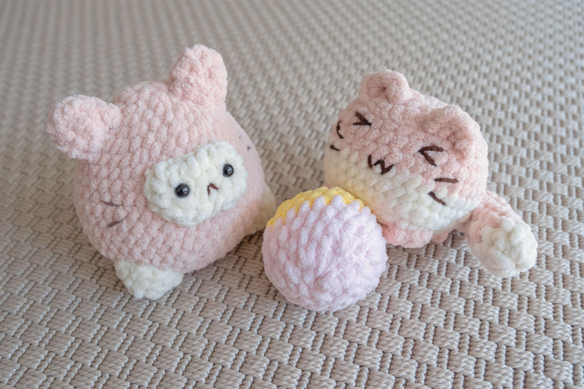 two white and pink kawaii kitty
